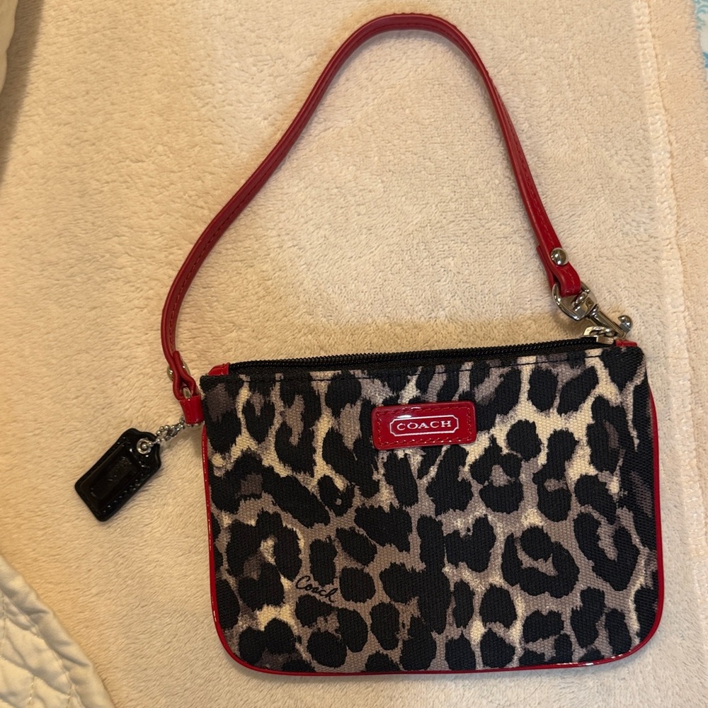 Coach Animal Print Wristlet with Red Trim